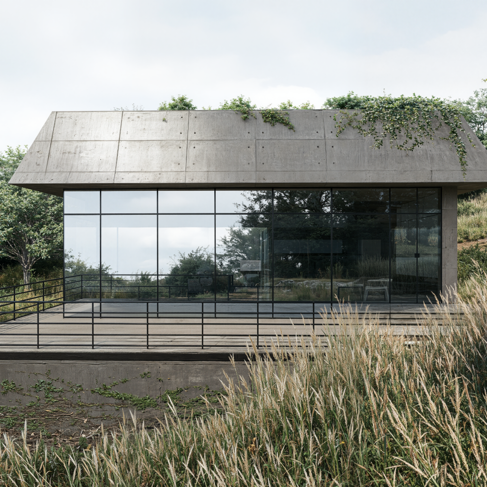 Casa moderna de vidrio con cubierta de concreto e integración vegetal en una ladera de Costa Rica.